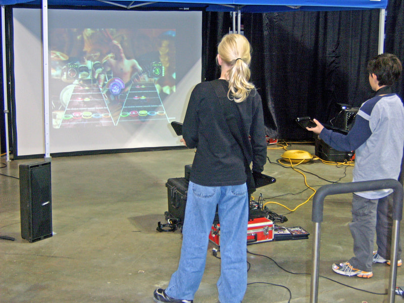 guitar hero game with projector/sound system